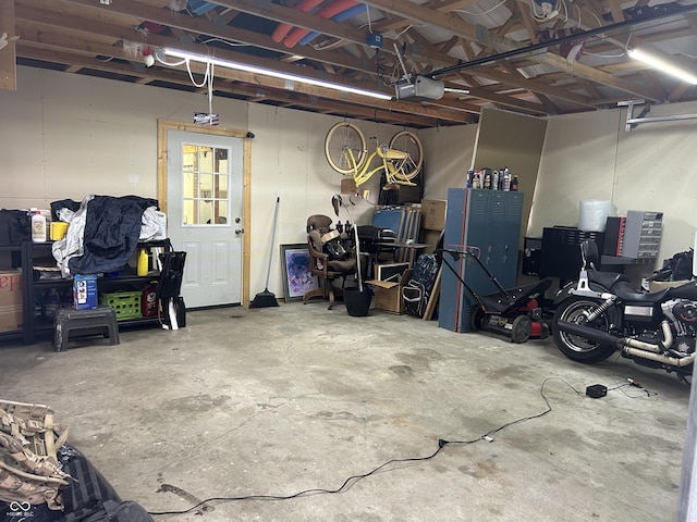 garage featuring a garage door opener