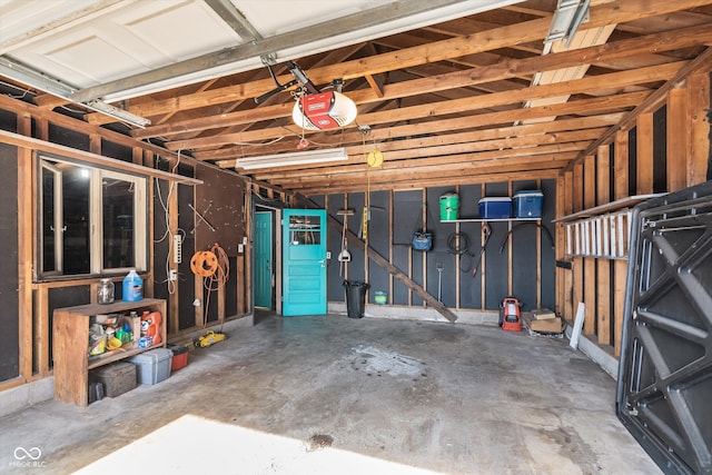 garage featuring a garage door opener