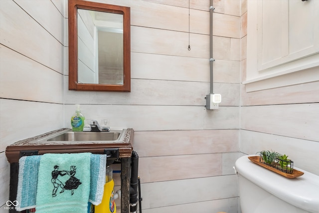 bathroom with toilet and sink