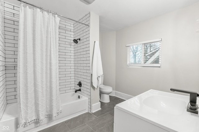 full bathroom featuring tile patterned flooring, shower / tub combo, vanity, and toilet