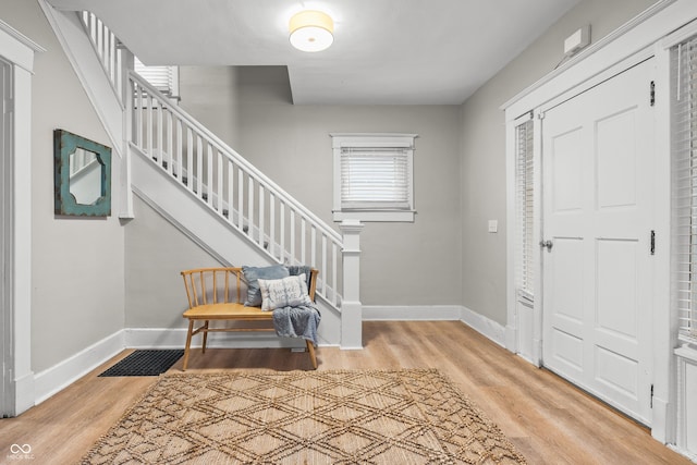 foyer with hardwood / wood-style flooring