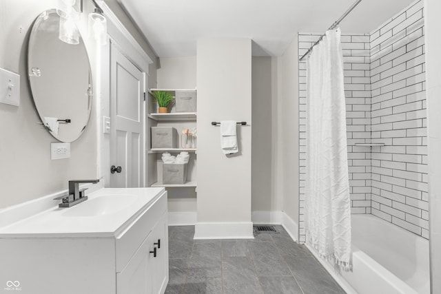 bathroom with tile patterned flooring, vanity, and shower / bath combination with curtain