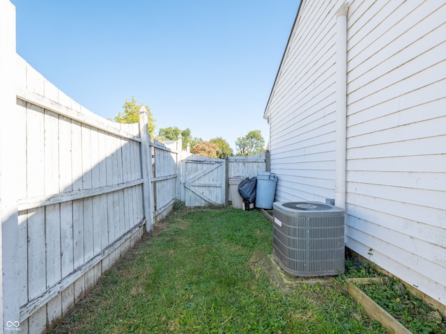 view of yard with central AC unit