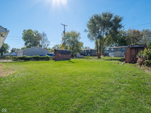 view of yard with a storage unit