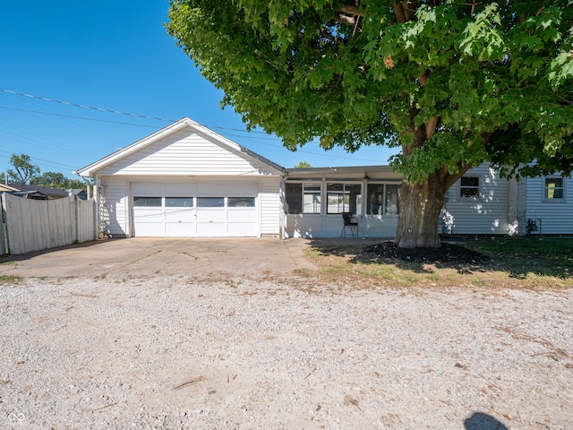 single story home with a garage