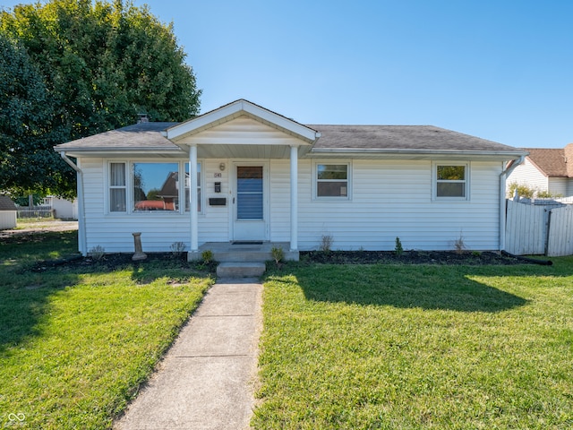 bungalow with a front lawn