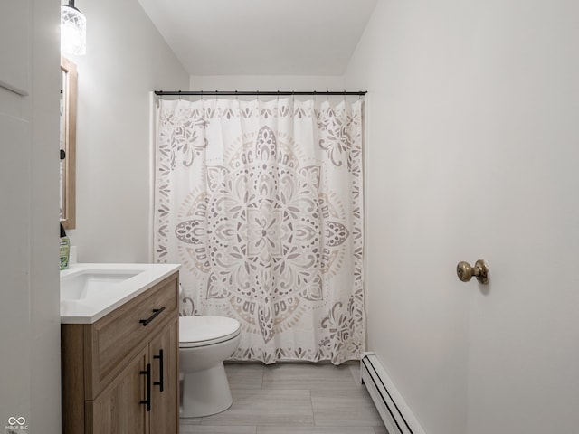 bathroom featuring a baseboard radiator, walk in shower, vanity, and toilet