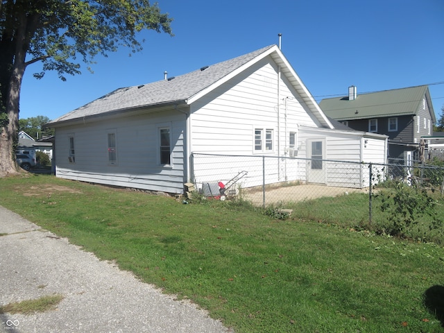 view of property exterior featuring a yard