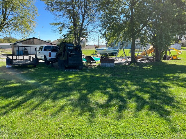 view of yard with a playground