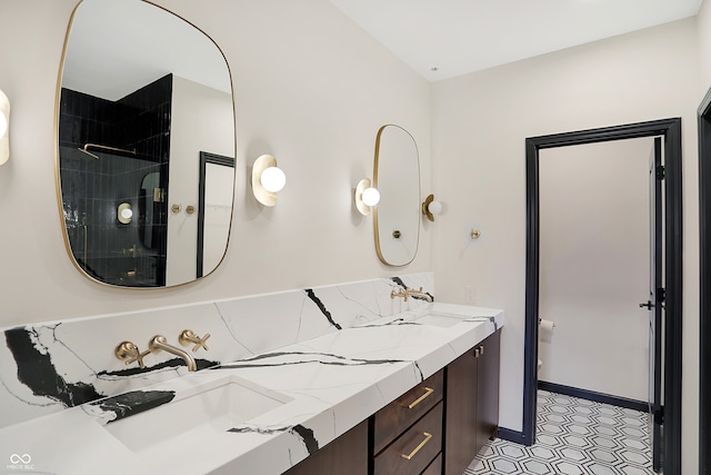 bathroom featuring vanity, a shower, and toilet