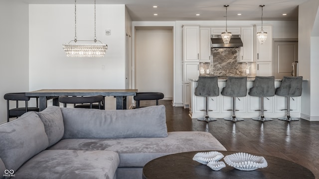 living room with dark hardwood / wood-style floors