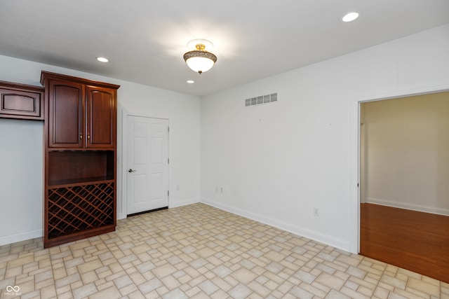 unfurnished room featuring light hardwood / wood-style floors