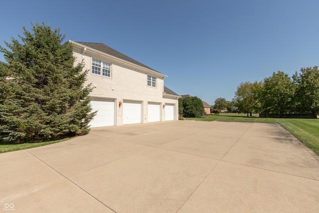 view of property exterior with a garage