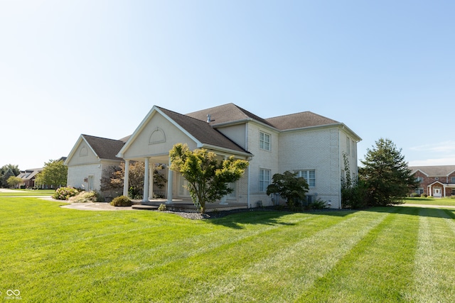 view of front of property with a front lawn