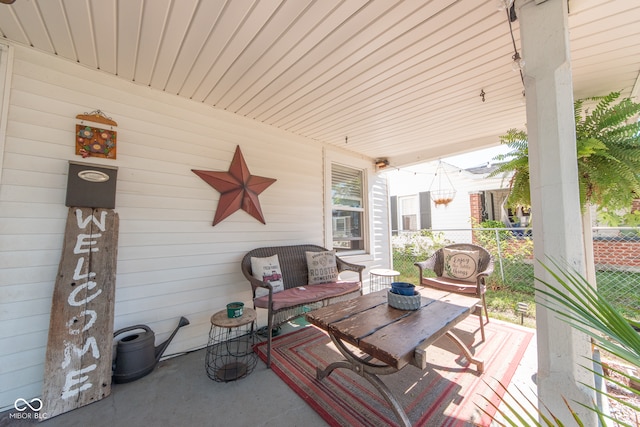 view of patio featuring a porch