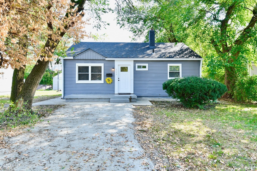 2035 N Tibbs Ave, Indianapolis, IN 46222 - ranch-style home with a chimney