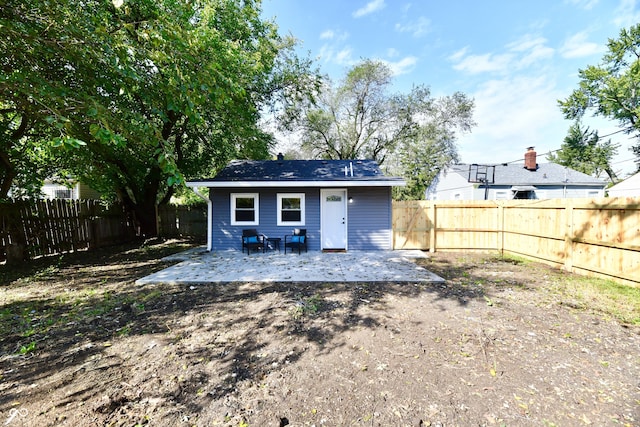 rear view of house featuring a patio area