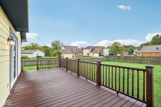 wooden deck with a yard