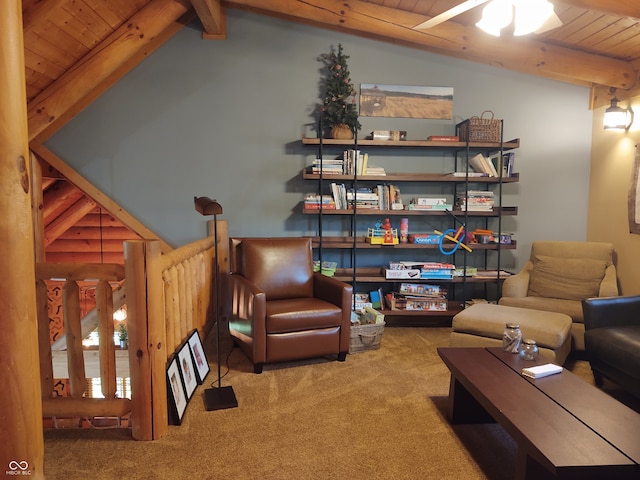 living area with carpet, lofted ceiling with beams, ceiling fan, and wooden ceiling