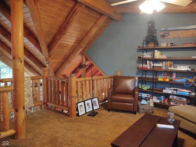 living room with vaulted ceiling with beams, wood ceiling, carpet, and ceiling fan