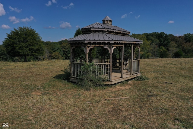 view of community with a gazebo and a lawn