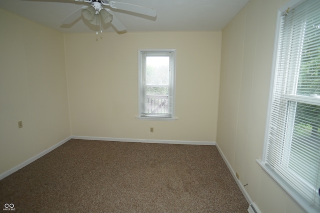 unfurnished room featuring carpet floors and ceiling fan