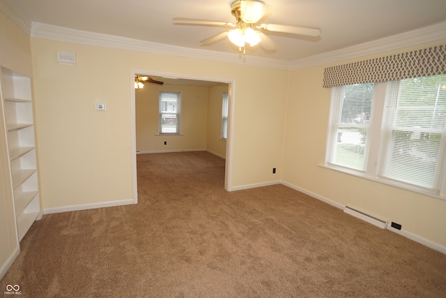 unfurnished room with crown molding, carpet flooring, ceiling fan, and a baseboard radiator