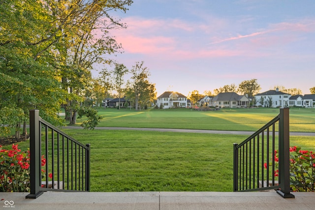 view of home's community featuring a yard