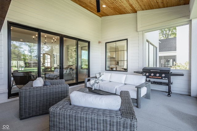 view of patio with grilling area, ceiling fan, and an outdoor hangout area