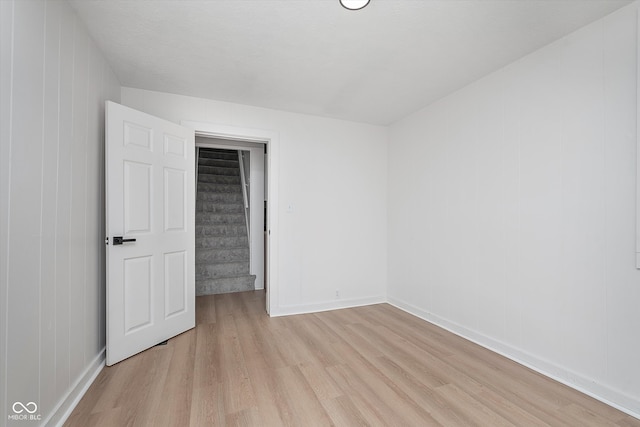 unfurnished bedroom with light hardwood / wood-style flooring