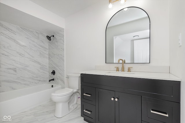 full bathroom with vanity, toilet, and tiled shower / bath