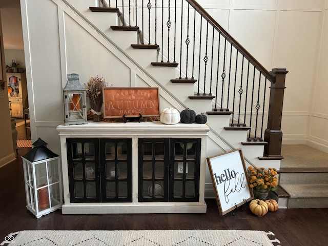 stairway featuring hardwood / wood-style flooring