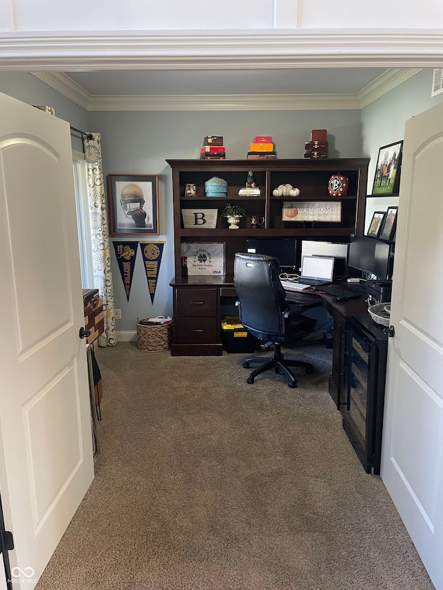 office area with ornamental molding and carpet