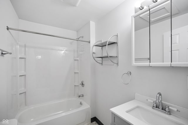 bathroom with vanity and washtub / shower combination