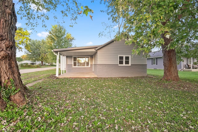 view of property exterior featuring a yard