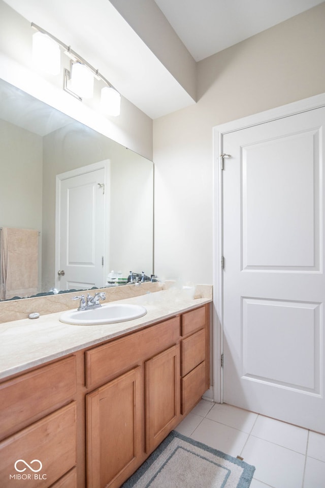 bathroom with vanity and tile patterned floors