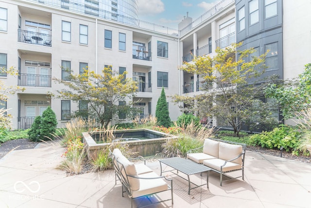 view of patio with a balcony