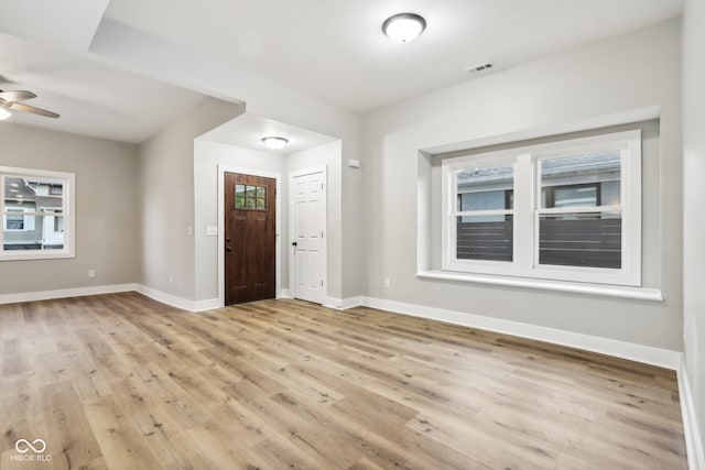 foyer featuring ceiling fan and light hardwood / wood-style flooring