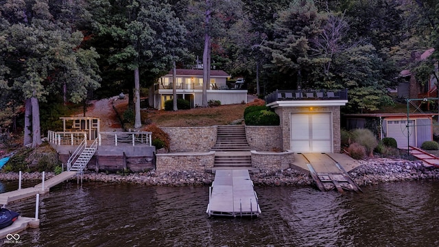 dock area with a water view