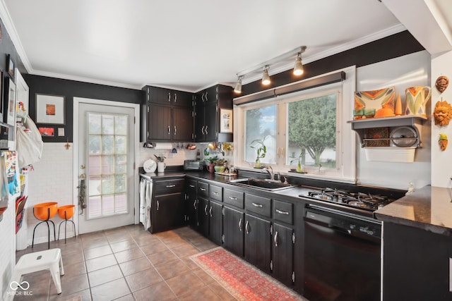 kitchen featuring track lighting, sink, black appliances, light tile patterned floors, and crown molding