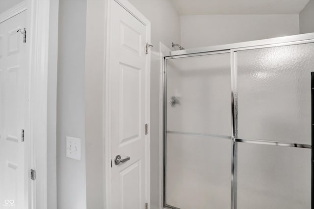 bathroom with an enclosed shower