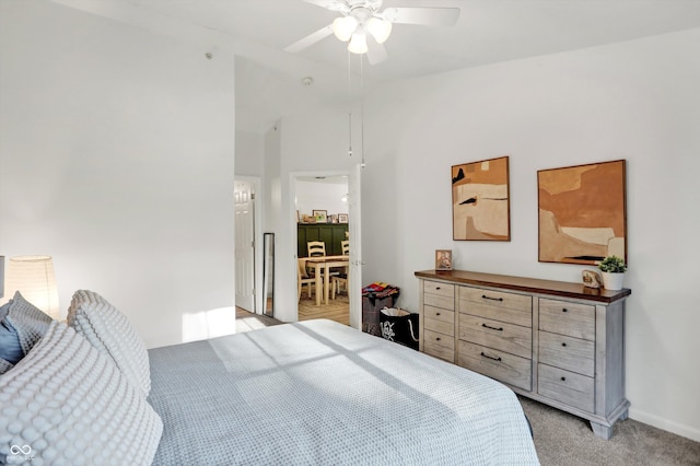 bedroom featuring light carpet and ceiling fan