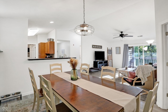 6517 Emerald Hill Ct Apt 312, Indianapolis, IN 46237 - dining area featuring baseboards, a ceiling fan, visible vents, lofted ceiling, and light wood finished floors