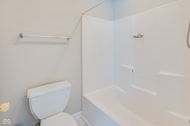 bathroom with toilet and shower / tub combination