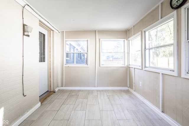 view of unfurnished sunroom