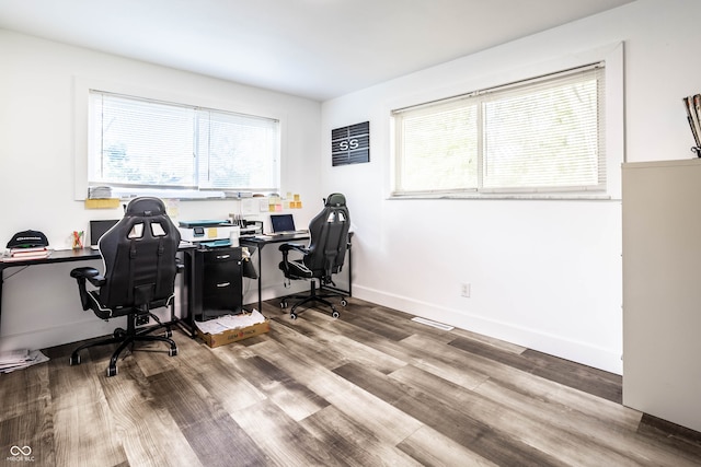 office with light hardwood / wood-style flooring