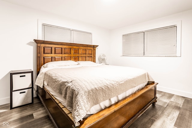 bedroom featuring dark hardwood / wood-style floors