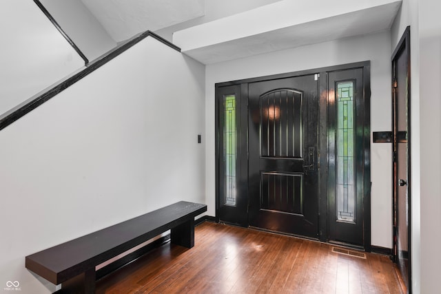 foyer entrance featuring dark hardwood / wood-style flooring