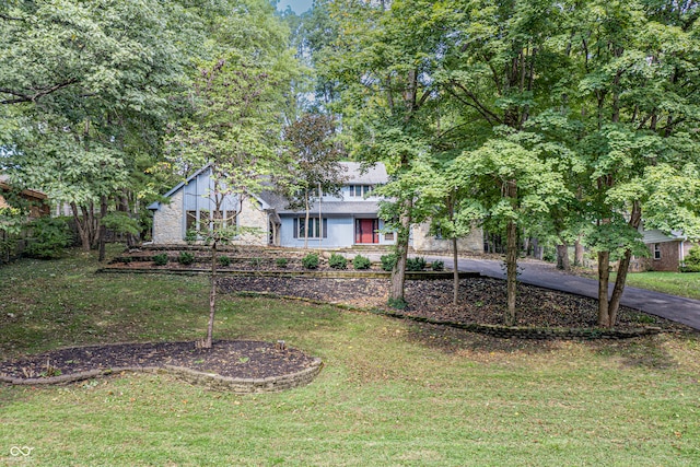 exterior space with a front yard