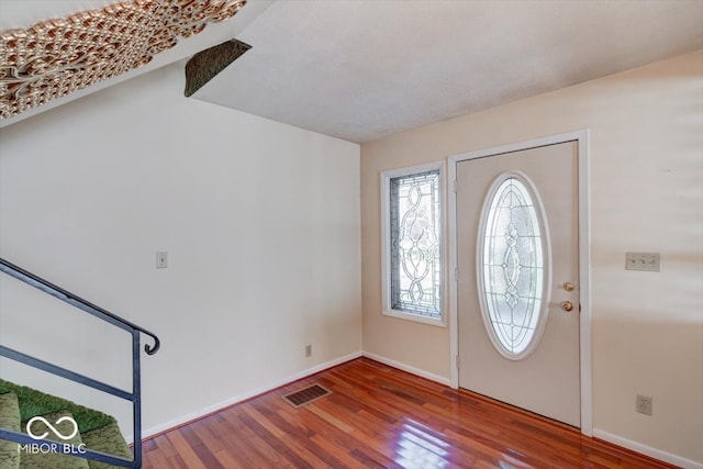 entrance foyer featuring hardwood / wood-style flooring